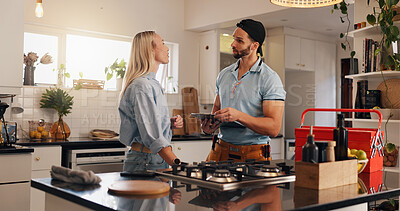 Buy stock photo Plumber, woman and clipboard with talking in kitchen for invoice, price or advice with maintenance in home. Handyman, client and discussion with repair services for leak, drain or sink at apartment