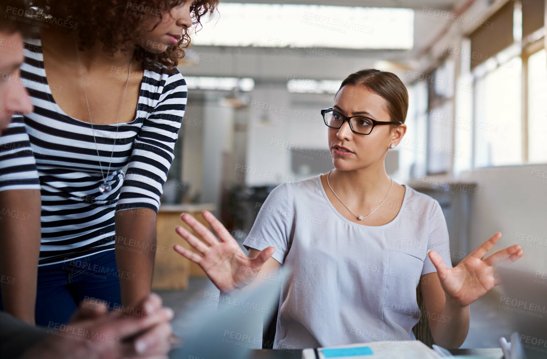 Buy stock photo Woman, business and staff in office for meeting with manager as graphic designers for customer feedback. Female person, people and teamwork for creative company with documents for project proposal