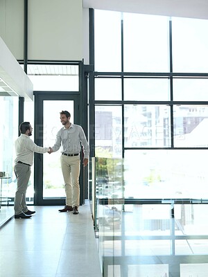 Buy stock photo Welcome, handshake and business people in office building for consulting, help or b2b networking. Teamwork, partnership and men shaking hands for thank you, collaboration and hiring, deal or offer