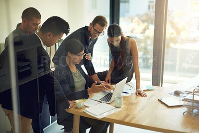 Business meeting, laptop and group of people with website review, online launch and discussion or teamwork. Corporate, professional or women and men reading, check or planning on computer in office