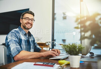 Buy stock photo Cropped portrait of a businessman working on his computer in the office