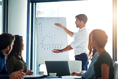 Buy stock photo Whiteboard, presentation and businessman brainstorming to team, planning or training in startup office meeting. Group, speaker and financial consultant with data, graph or erp statistics for coaching