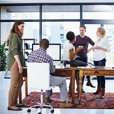 Buy stock photo Creative people, discussion and meeting with team for collaboration, ideas or creativity at office. Young group of employees working, talking or conversation in startup for productivity at workplace