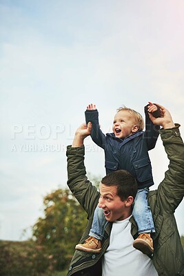 Buy stock photo Family, shoulder and father with baby in park for bonding, playing and laugh together outdoors. Nature, blue sky and happy dad carry young boy for child development, love or fun on weekend or holiday