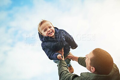 Buy stock photo Dad, child and playing together with sky, happy laugh and bonding on outdoor adventure. Father, son and playful support games in nature for growth, development and fun with energy, smile and care.