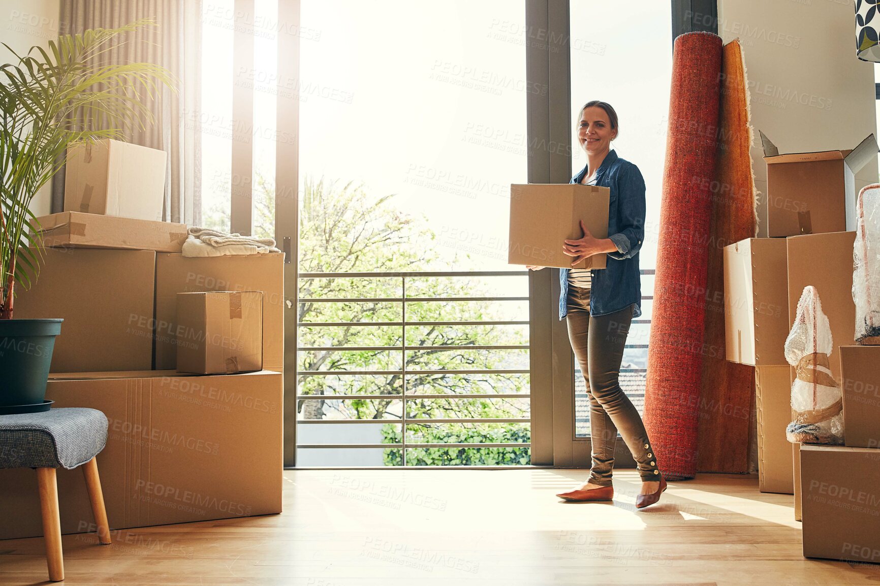 Buy stock photo New home, portrait and happy woman holding box for property sale, mortgage or investment. Real estate, moving or person with cardboard for relocation, unboxing or packing in apartment with lens flare