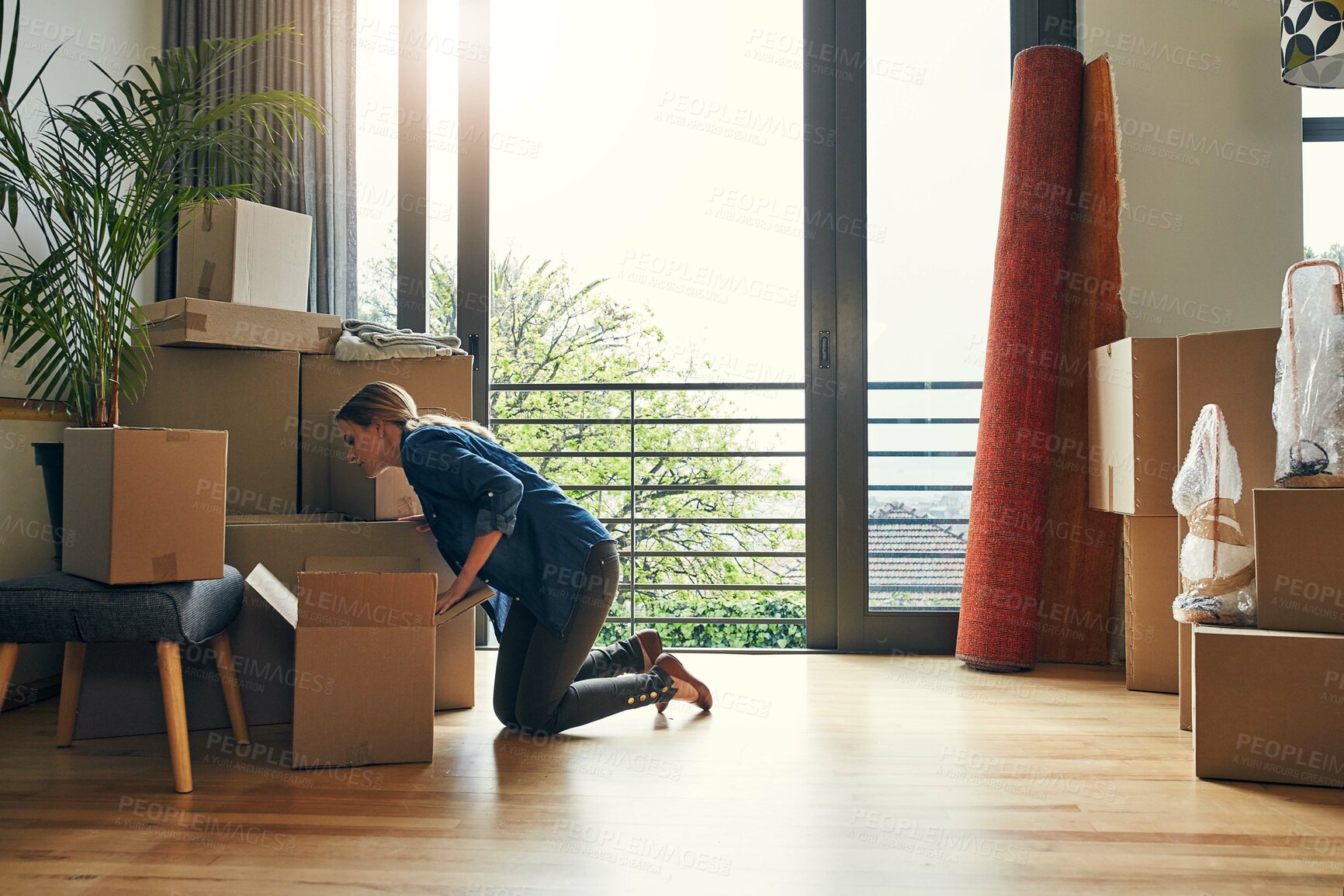 Buy stock photo New home, moving and woman packing box for property sale, mortgage and house investment. Real estate, unboxing and person with cardboard for relocation, packaging or storage for delivery to apartment