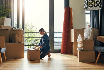 Buy stock photo New home, moving and woman packaging box for property sale, mortgage and house investment. Real estate, unboxing and person with cardboard for relocation, packing or storage for delivery to apartment