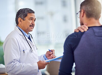 Buy stock photo Doctor, paperwork and shoulder pain with people in clinic for healthcare, advice and medical expert. Injury, appointment and support with patient in hospital for diagnosis, physician and feedback