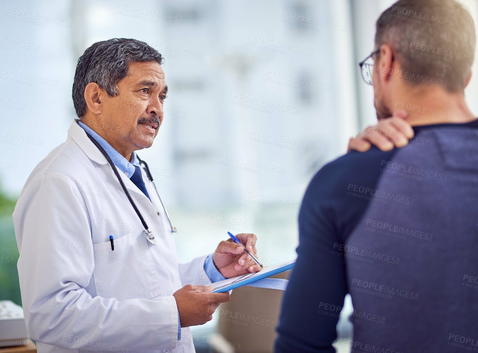 Buy stock photo Doctor, paperwork and shoulder pain with people in clinic for healthcare, advice and medical expert. Injury, appointment and support with patient in hospital for diagnosis, physician and feedback