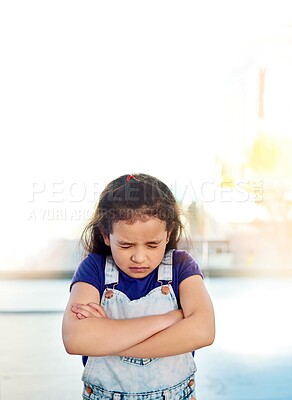 Buy stock photo Sad, young girl and arms crossed for depression, anger and mental health indoor at home with lens flare. Upset, female child and frustrated or mad from overstimulation with autism or adhd at house
