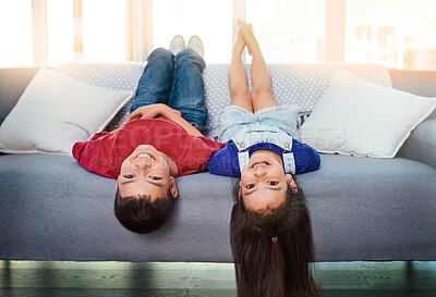 Buy stock photo Portrait, living room and upside down children on sofa for fun, game and playing. Kids, sofa and growth in healthy environment, joy and laughing with free time, active and cheerful at home