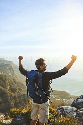 Buy stock photo Happy, man and hiking with success on mountain of travel celebration, nature freedom and achievement. Male person, cheering and trekking victory for fitness adventure, climbing challenge and location