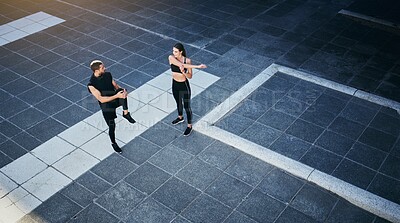 Buy stock photo Fitness, stretching or couple in city ready to start workout, training or outdoor exercise in London. Aerial, runners or sports man with woman in running warm up for energy, wellness or challenge