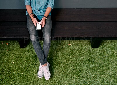 Buy stock photo Legs, hands and phone screen for online chat, communication and reading email of study opportunity. Bench, person or student with mobile app for news mockup, campus FAQ or college registration above