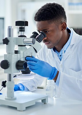 Buy stock photo Black man, scientist and microscope in lab with analysis for test sample, experiment and dna pattern. Person, gloves and ppe for medical research at pharma company with thinking, gear and innovation