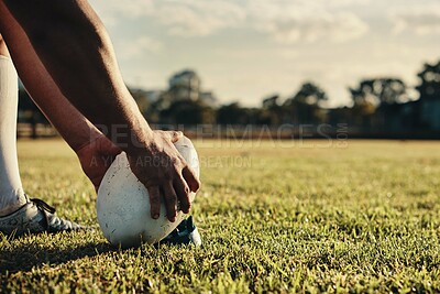 Buy stock photo Ball, hands and rugby with people outdoor on field for competition, challenge or scoring closeup. Exercise, performance and sports training with player on grass for kick in game or match at stadium