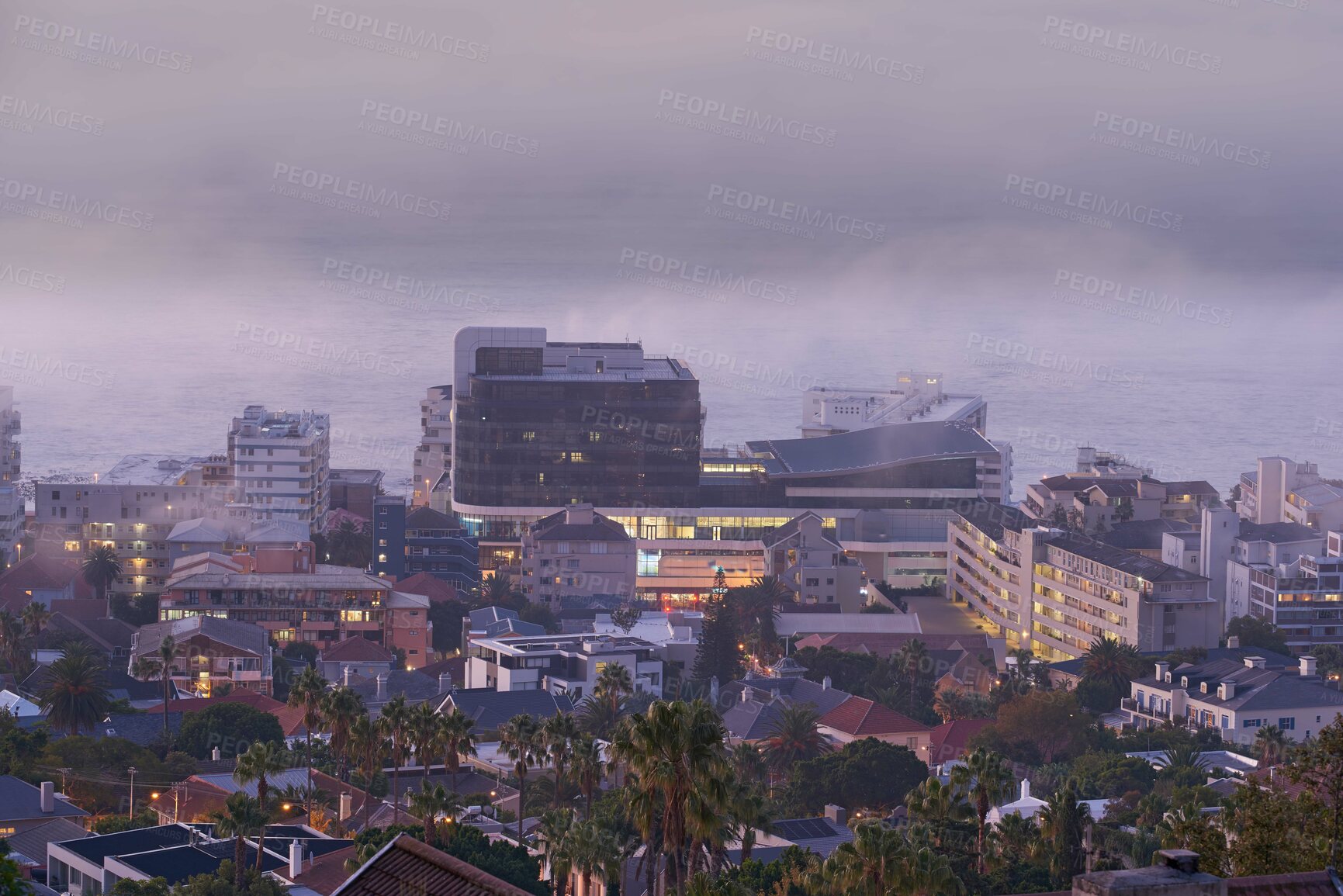 Buy stock photo City view of building lights on a cold winter day. Outdoor, streets and architectural detail around foggy background in a town. Tall palm trees, life in an urban coastal town 