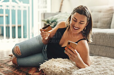 Buy stock photo Phone, credit card and woman on floor for online shopping, e commerce and fintech payment, loan or finance at home. Happy person relax on carpet, typing and internet banking on mobile app transaction