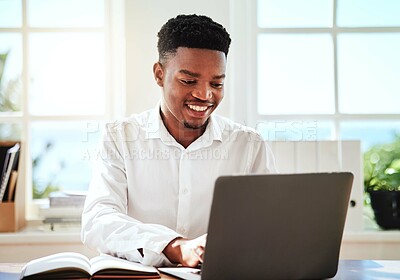 Buy stock photo Laptop, typing and schedule with a black man graphic designer working online with his computer and notebook. Email, creative and internet with a young male employee at work on a creative project