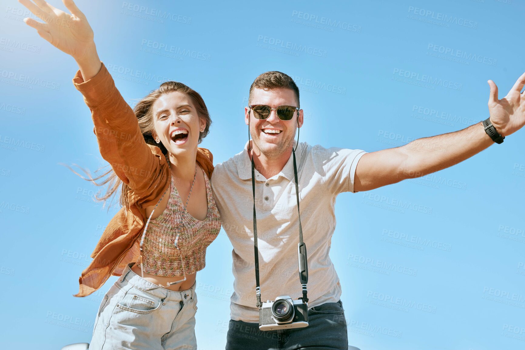 Buy stock photo Happy, couple and travel with freedom, love and vacation adventure together having a fun. Portrait of happy couple in nature on holiday journey with free, relax and happiness feeling in summer sky