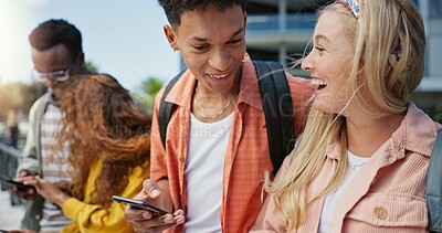 Buy stock photo Friends, students and phone with laughing at college, campus or happy for diversity, learning or development. Gen z couple, women and men on mobile app, web chat or meme on social media in university