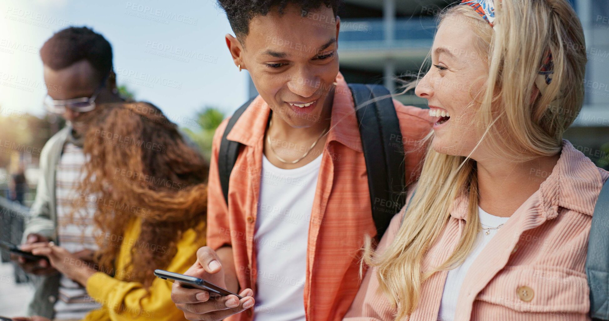 Buy stock photo Friends, students and phone with laughing at college, campus or happy for diversity, learning or development. Gen z couple, women and men on mobile app, web chat or meme on social media in university