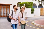 Happy, couple and tourist with camera outdoor for adventure, sightseeing and walking with holding hands. Man, woman and equipment for photography on tour, cultural experience and travel documentation
