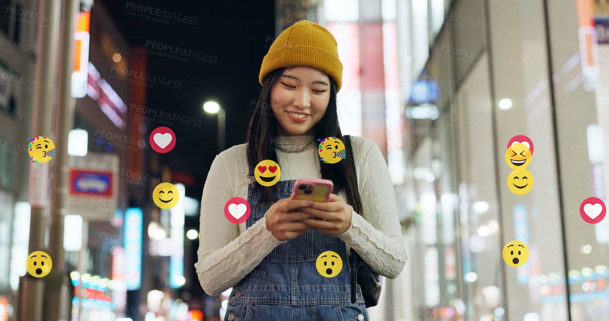 Buy stock photo City, emoji and walking with influencer at night for interaction with social media followers. App, phone and reaction overlay with woman outdoor for late sightseeing or travel as content creator