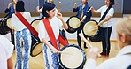 Japanese, learning or people with drums for music on instrument for performance, creativity or class. Taiko, woman or female drummers learning in band to play in rehearsal for culture, rhythm or beat