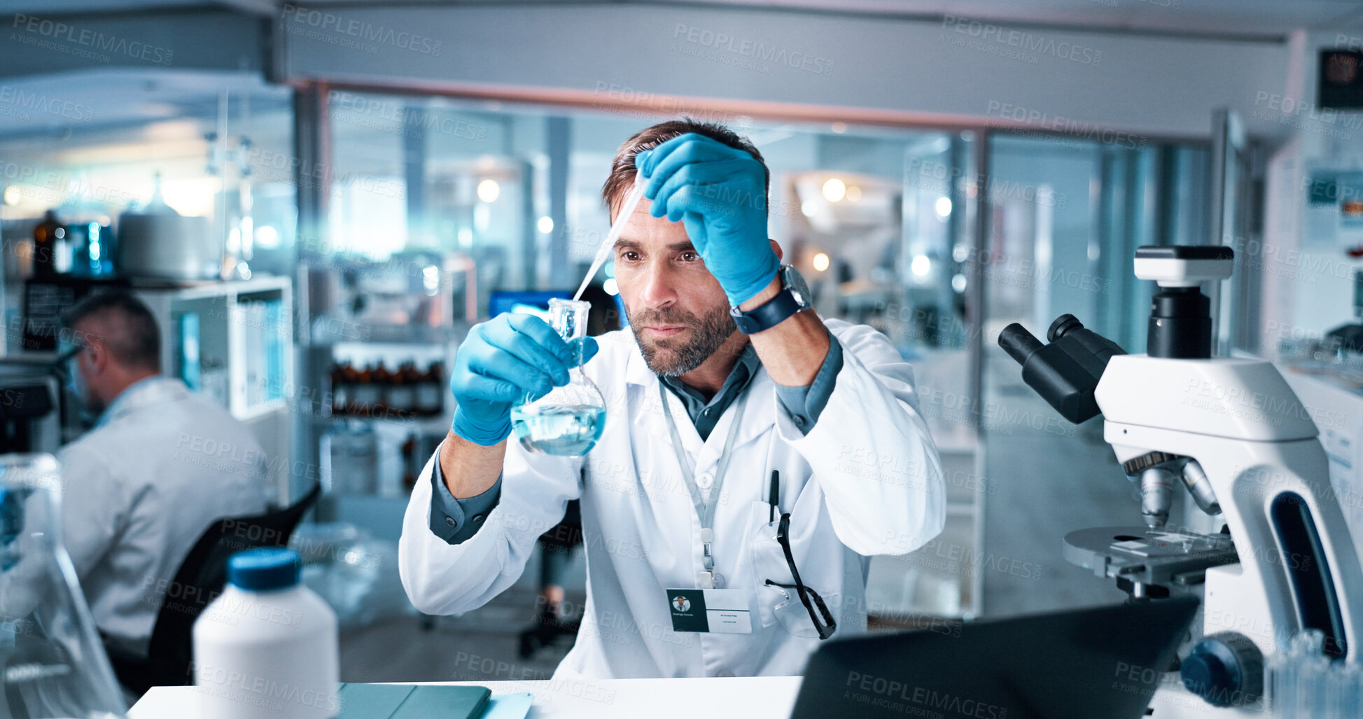 Buy stock photo Chemical, man and scientist with beaker and dropper in laboratory for pharmaceutical experiment or research. Liquid, glass and male medicinal chemist with formula for reaction observation with cure.