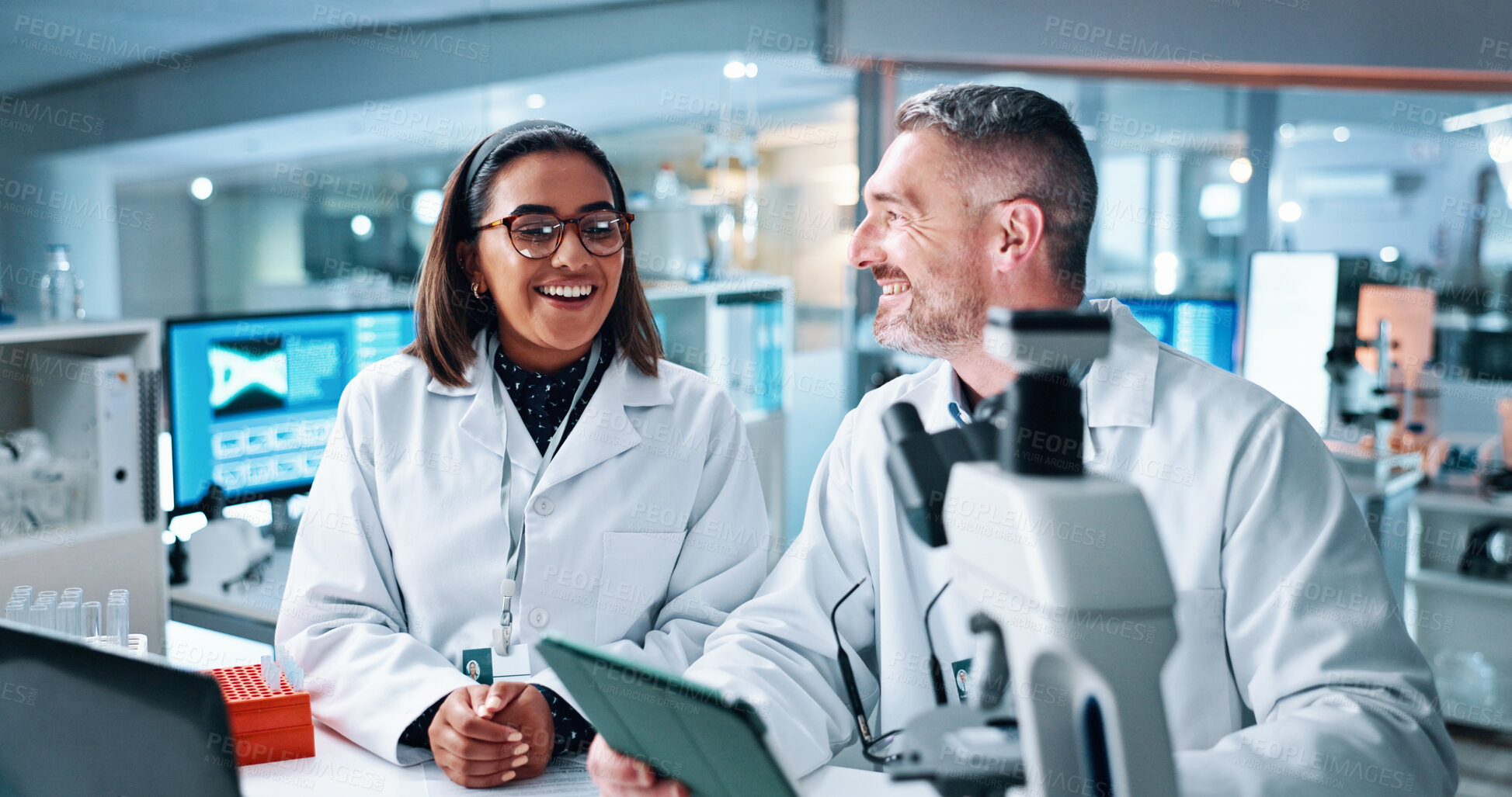 Buy stock photo Science, smile and tablet with people in laboratory together for breakthrough or development. Collaboration, laptop and microscope with happy research team in medical trial for investigation