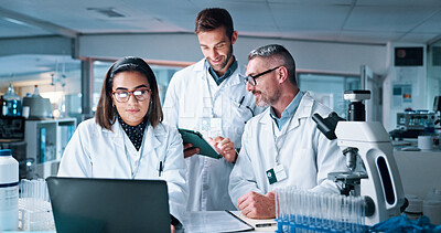 Buy stock photo Laptop, science and tablet with people in medical lab together for breakthrough or development. Collaboration, computer or microscope with mentor and research team in clinical trial for discovery