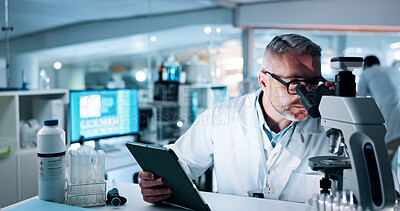 Buy stock photo Scientist, man and microscope with tablet, analysis and medical research for human genome sequence. Mature person, touchscreen and clinical trial with app, investigation and DNA study in laboratory