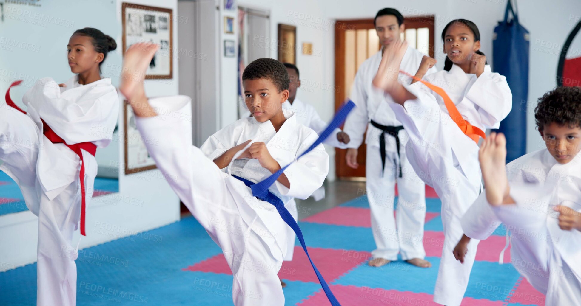 Buy stock photo Exercise, karate and sports with kids in class for combat, fighting or self defense training. Development, fitness or growth with children and sensei in dojo for martial arts lesson or practice
