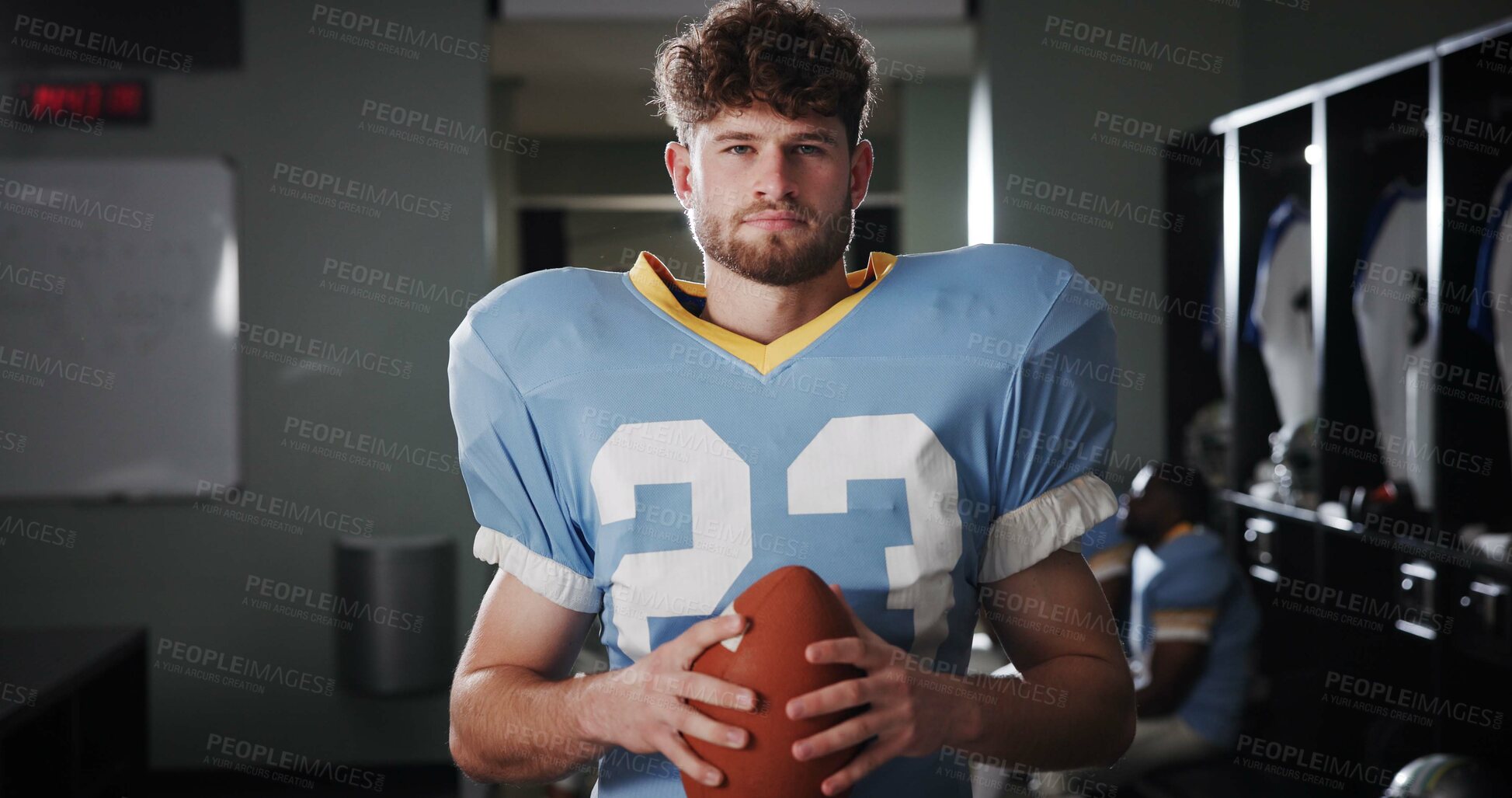 Buy stock photo Athlete, football player or ball in locker room for portrait, protective gear or quarterback in tournament. National sport, serious or man in cloakroom for fitness, game confidence or safety in USA