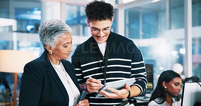 Buy stock photo Web designer, tablet and advice with woman in office for software system or website update. Night, developer or backend engineer with feedback for company development or workplace project management