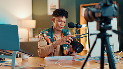 Buy stock photo Influencer, camera and man with mic for review, podcast or social media promotion. Filming, product or content creator show tech for photography, ratings or picture quality for live streaming at home
