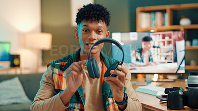 Buy stock photo Influencer, live streaming and portrait of man with headphones for tech review, feedback or vlog. Content creator, social media and person in recording video, podcast and opinion to audience in home