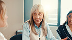 Women, team and talking at meeting, finance and report for revenue growth with advice at office. People, accounting and discussion with insight for review, feedback and group with planning at agency