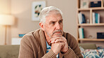 Thinking, depression and memory with old man on sofa for Alzheimer, retirement and reflection. Nostalgia, sad and loneliness with senior person in living room of home for dementia and mental health