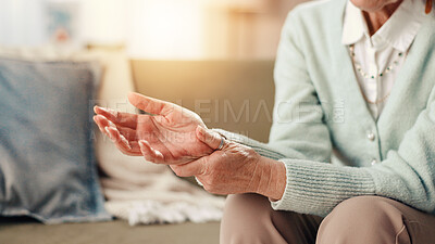 Buy stock photo Senior woman, hands and injury with muscle tension for carpal tunnel syndrome or fibromyalgia. Elderly, female person or sore wrist with pain or ache for joint arthritis or chronic illness at home
