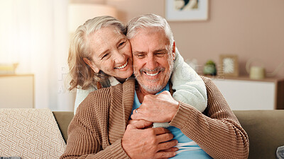 Buy stock photo Senior woman, man and hug on sofa with smile, care and bonding with love in retirement in lounge. Elderly people, couple and embrace with trust, loyalty and happy marriage in living room at house