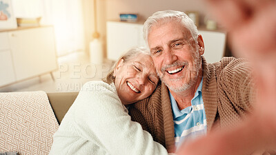 Buy stock photo Senior, happy couple or hug with selfie on sofa for picture, photography or memory together at home. Elderly man, woman or lovers with smile in relax on couch for capture moment, embrace or love