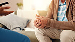 Nurse, hands and healthcare with old man on sofa for occupational therapy, advice and consulting. Medical, caregiver and retirement with senior person in nursing home for wellness and support