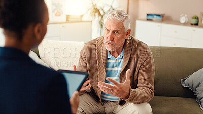 Buy stock photo Elderly man, consultation or nurse with tablet for healthcare discussion, advice or assisted living. Senior, male person or patient talking with caregiver on sofa for medical help or therapy at house