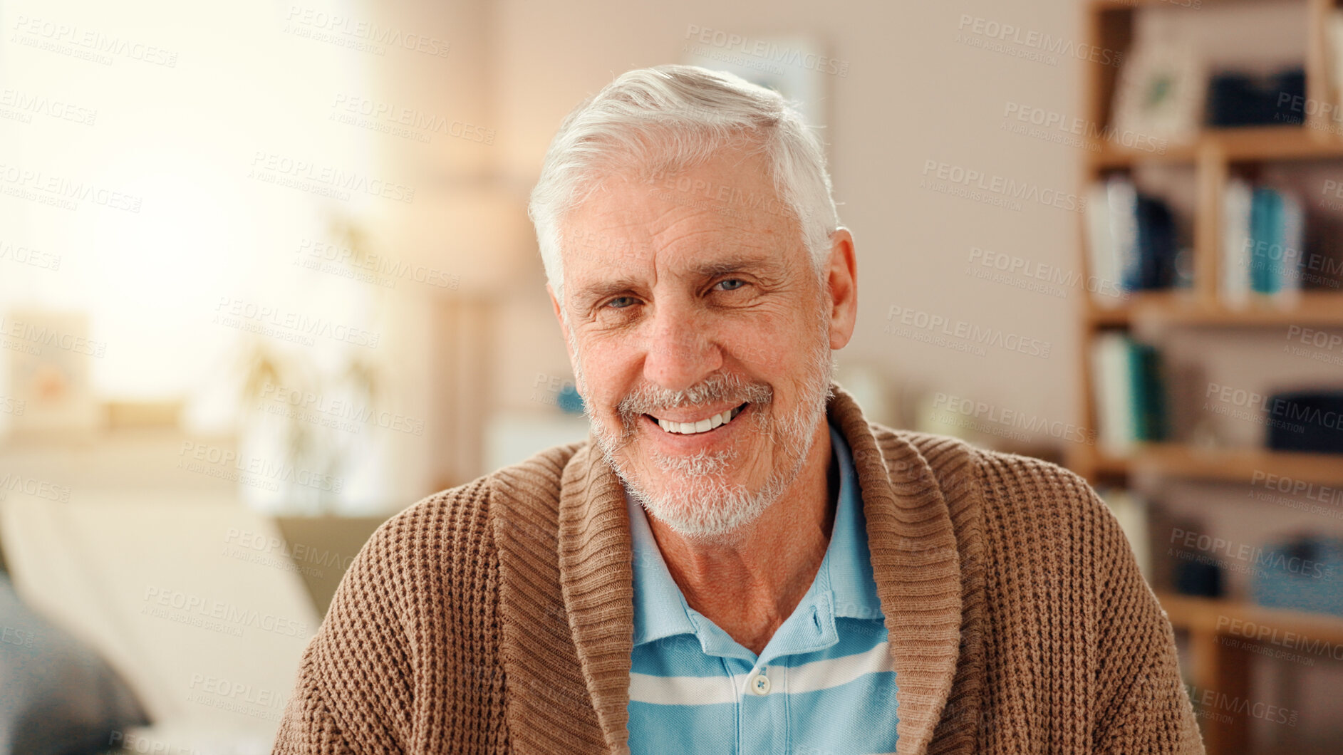 Buy stock photo Senior man, happy and portrait on sofa in home, relax and pride in living room for retirement. Elderly person, smile and face on couch in lounge for rest, confidence and mindset at house in Germany