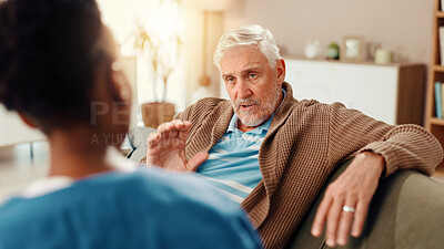 Buy stock photo Nurse, talking and healthcare with old man on sofa for occupational therapy, advice and consulting. Medical, caregiver and retirement with senior person in nursing home for wellness and support