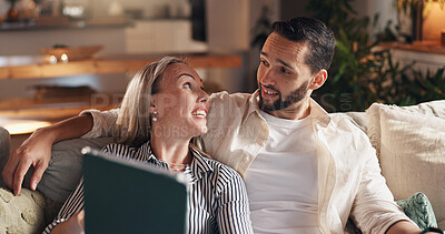 Buy stock photo Couple, tablet and happy on sofa, relax and discussion with notification on social network in home. People, man and woman with application on couch for film, talk or streaming in lounge at apartment