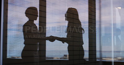 Buy stock photo Business people, shaking hands and silhouette at office, agreement and deal b2b collaboration. Partnership, employee and handshake with success, achievement and thanks with recruitment at HR agency